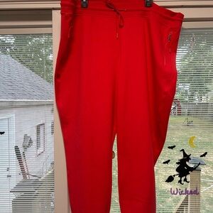 woman’s coral colored joggers XXL